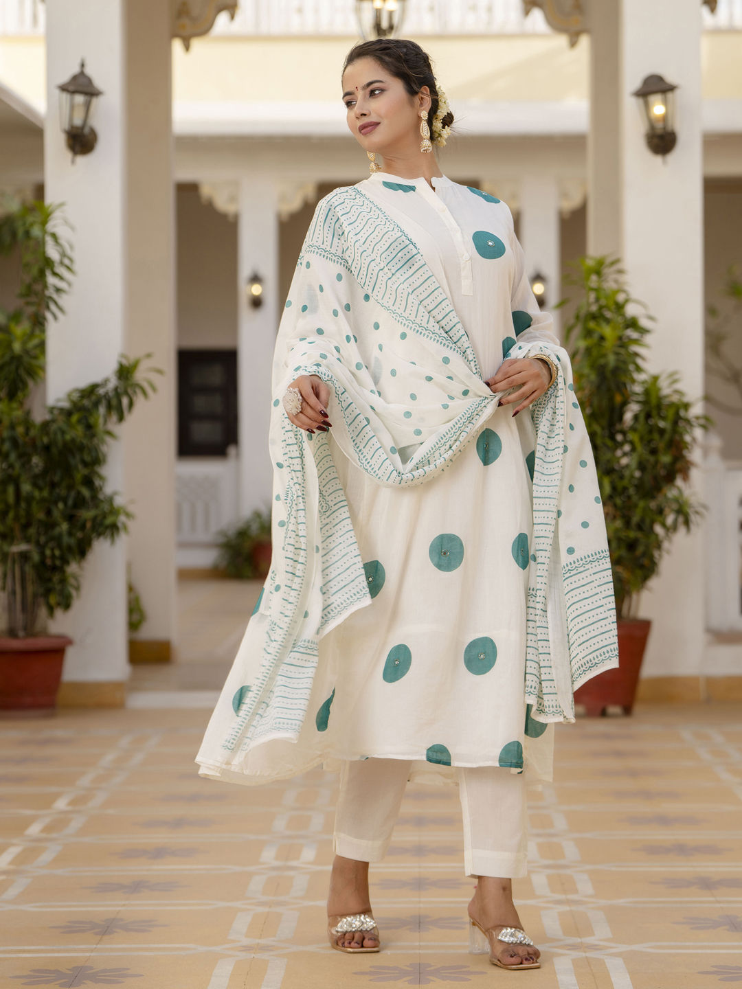 A line style cotton mulmul fabric off white color kurta with bottom and dupatta