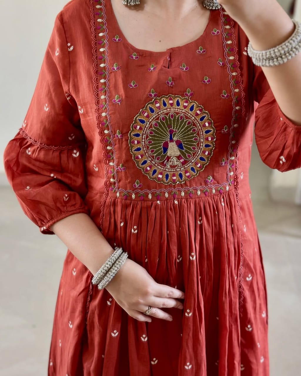 Women Rust Cotton Peacock Embroidery Kurta Pant and Mulmul Dupatta set